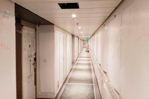 A corridor leading to cabins